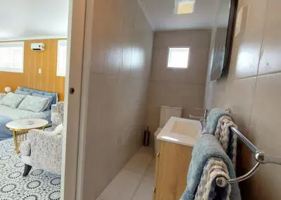 Quiet, private & luxurious self-catering AirBnB accommodation and retreat with exclusive access to our swimming pool for a relaxing place to stay in Auckland.