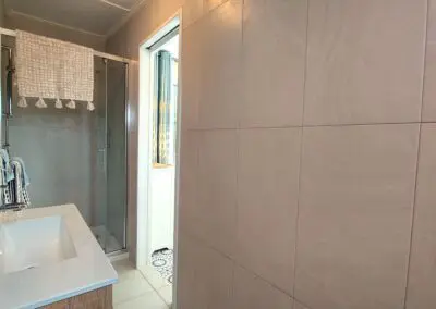 Quiet, private & luxurious self-catering AirBnB accommodation and retreat with exclusive access to our swimming pool for a relaxing place to stay in Auckland.