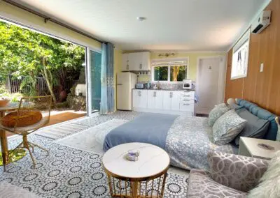 Quiet, private & luxurious self-catering AirBnB accommodation and retreat with exclusive access to our swimming pool for a relaxing place to stay in Auckland.