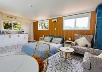 Quiet, private & luxurious self-catering AirBnB accommodation and retreat with exclusive access to our swimming pool for a relaxing place to stay in Auckland.
